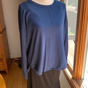 Sweater. Light weight. Front is 21”. Back is 25”. 80% viscose 20% nylon